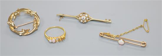 A 9ct. gold dolphin brooch, an 18ct. gold ring and two yellow metal bar brooches.